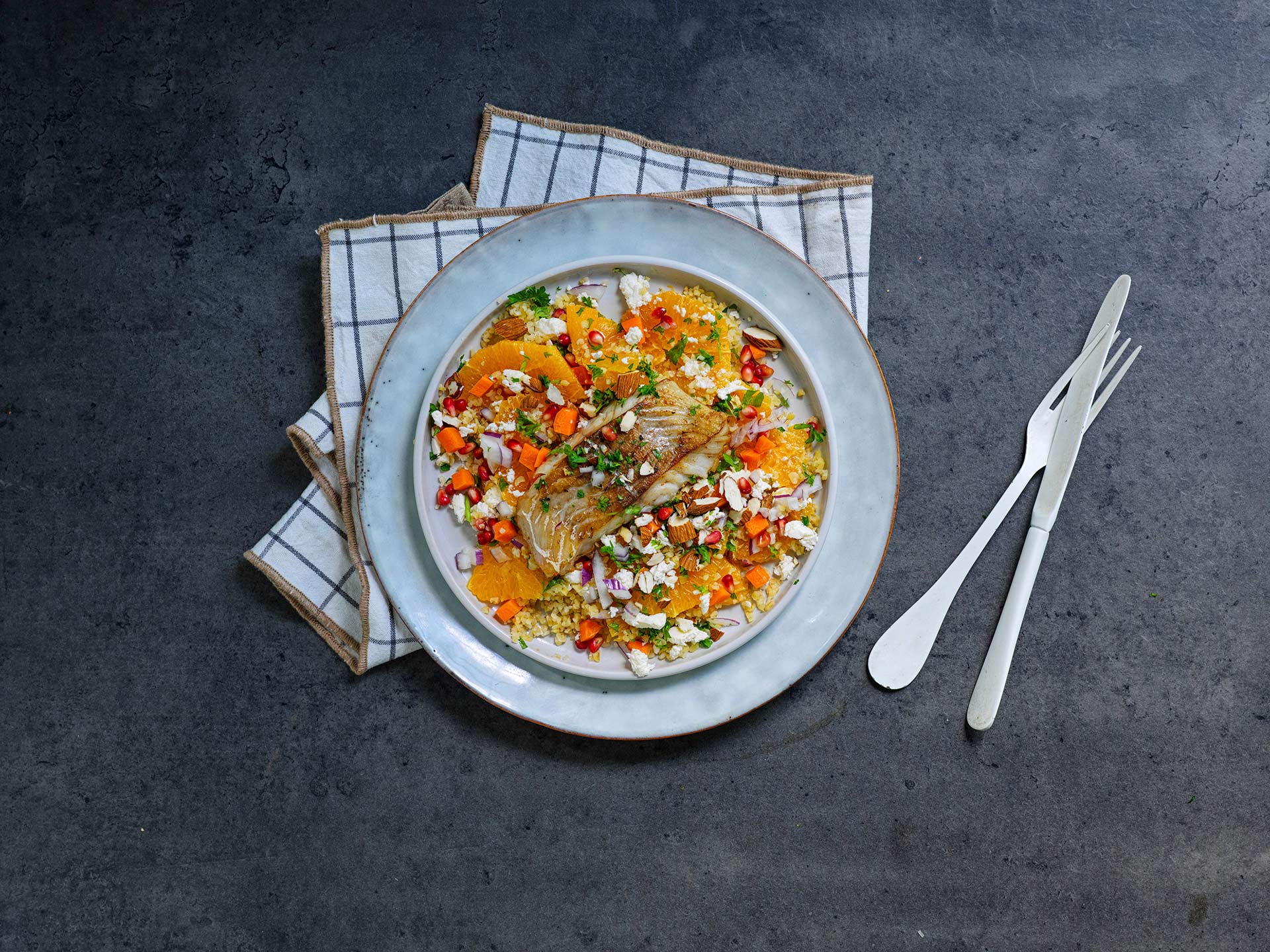 Baked pollock with warm salad