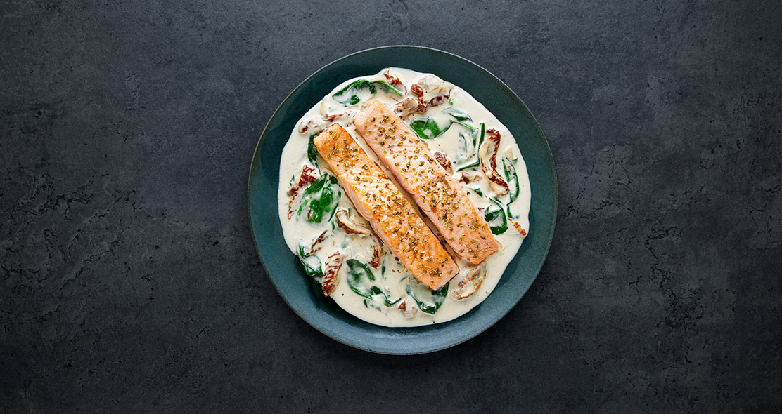 Norwegian salmon with creamy tuscan sauce